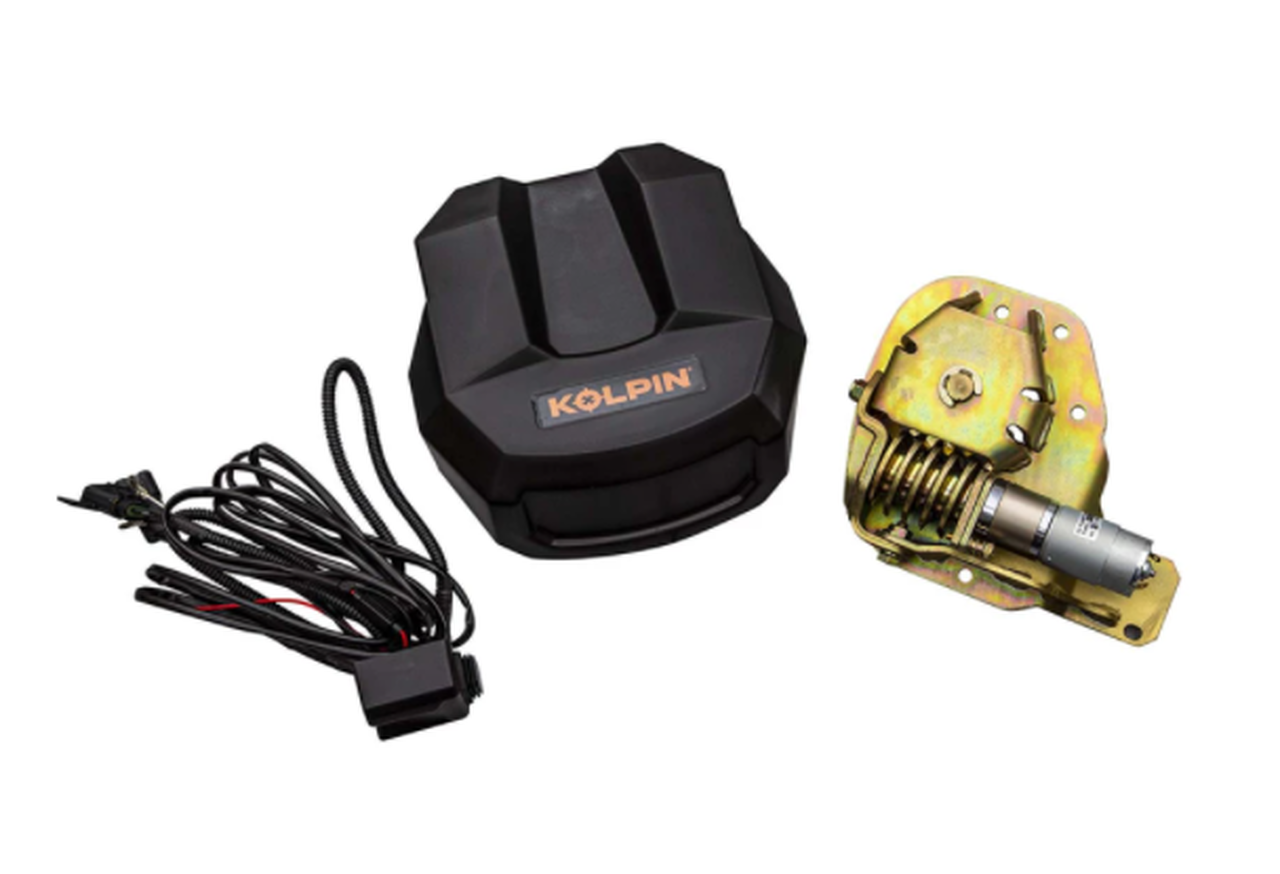 Kolpin Conqueror plow kit for Can-Am winch, wiring harness and brass plow lift actuator laid out