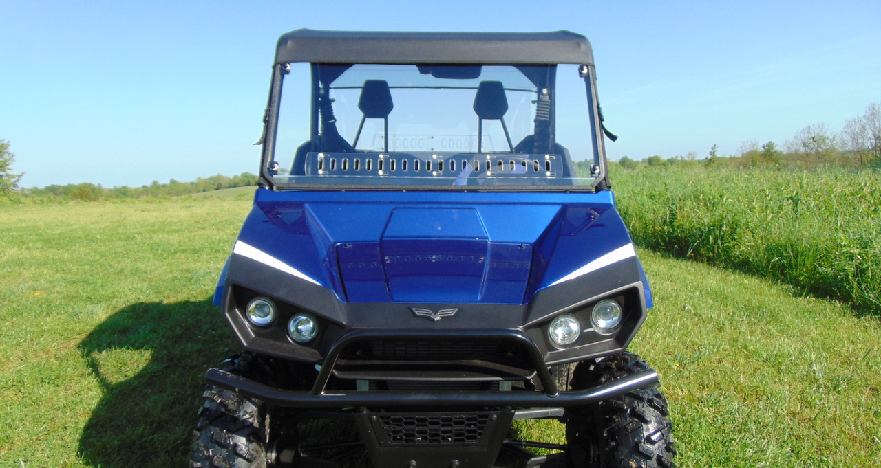 Front view of a blue Arctic Cat Stampede with the 3 Star soft top mounted above a hard windshield