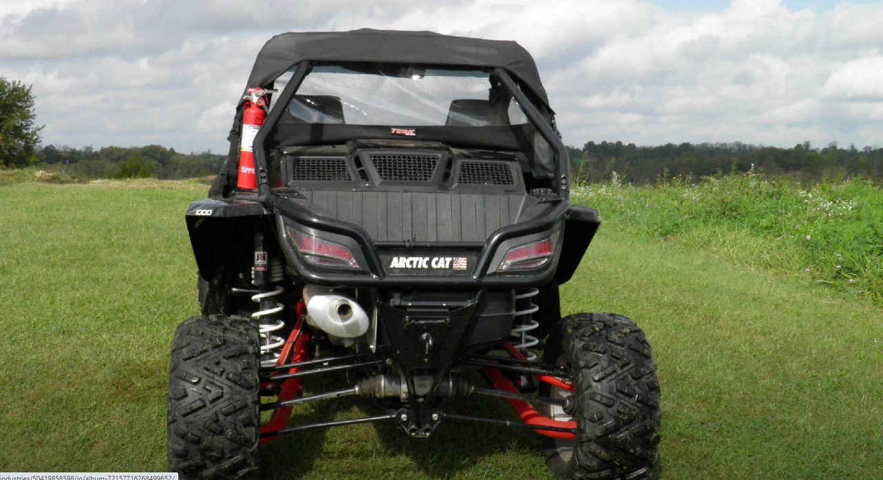 Straight rear view of an Arctic Cat Wildcat showing the 3 Star soft rear window panel of the cab enclosure