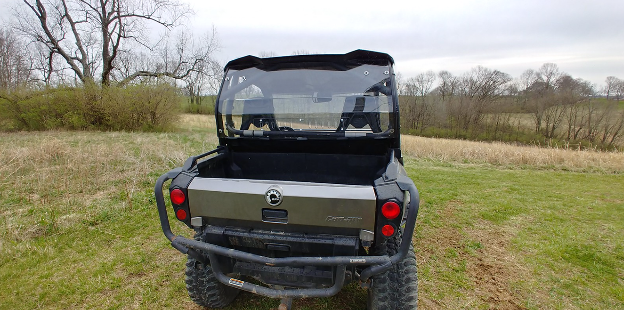 Straight rear view of the 3 Star tinted Lexan rear window above the tailgate of the gray Can-Am Commander