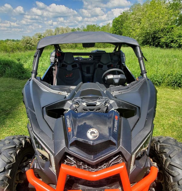 3 Star black soft top installed on a Can-Am Maverick X3, straight front view over the hood with seats below