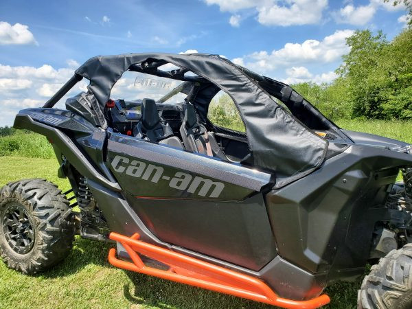 3 Star soft upper doors kit on a gray Can-Am Maverick X3 with a soft top, side view in a sunny field