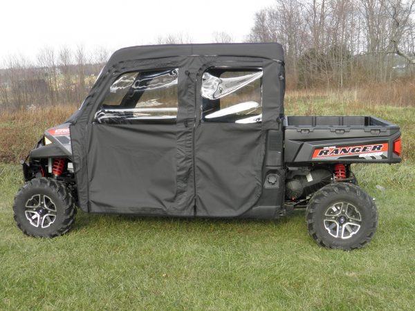 3 Star soft doors and rear window combo installed on a red Polaris Ranger 1000 Crew, full side view in a field