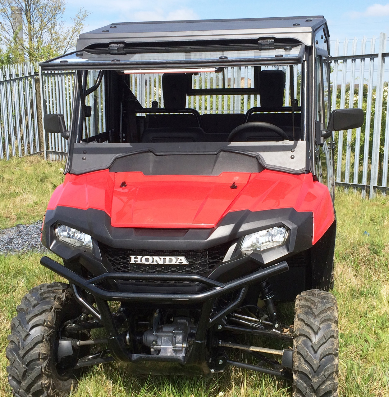 Honda Pioneer 700 hard cab enclosure by HardCabs - steel roof, tilt-out glass windshield, poly doors
