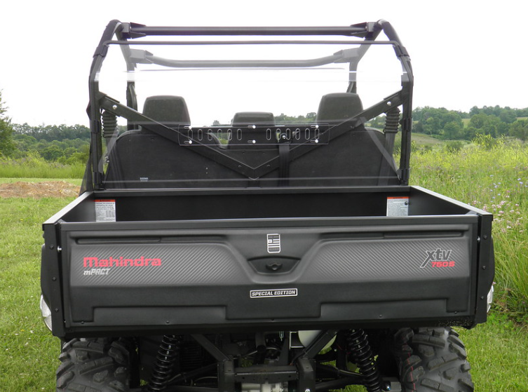Straight rear view over the tailgate of the 3 Star Lexan back panel with the headrests visible behind it