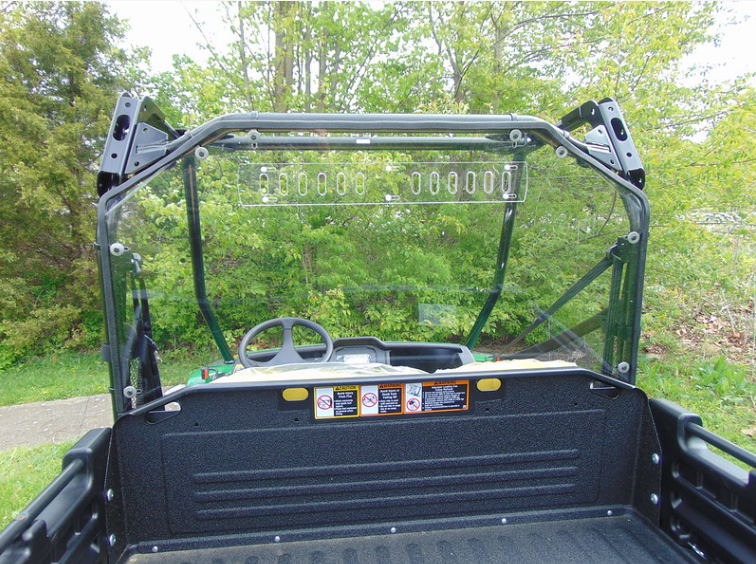 Close rear view from inside the bed of the 3 Star Lexan back panel showing the row of vent holes along the top