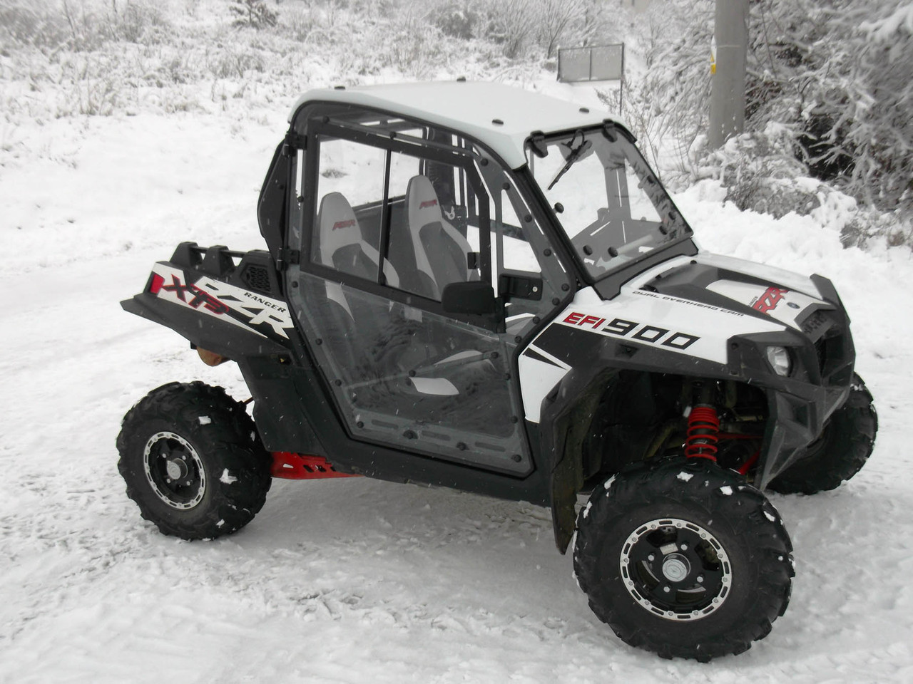 Polaris RZR XP 900 hard cab enclosure by HardCabs - steel roof, tilt-out glass windshield, poly doors