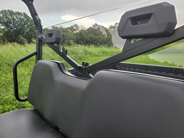 Close-up from inside the cab of the 3 Star Lexan back panel clamp on the cage behind the Ranger 570 headrests
