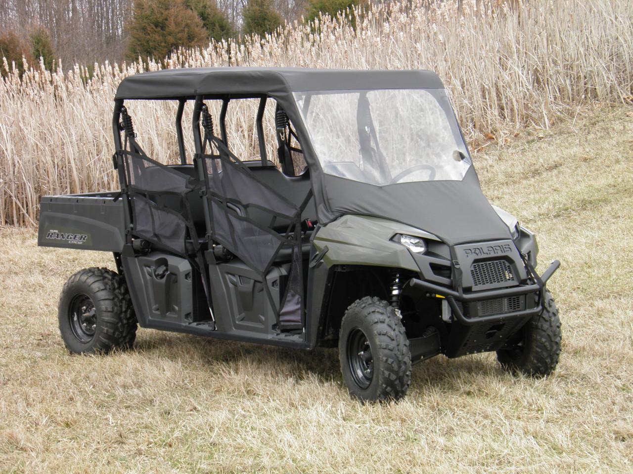 3 Star vinyl windshield and black top combo on a green Polaris Ranger 570 Crew, front three-quarter view