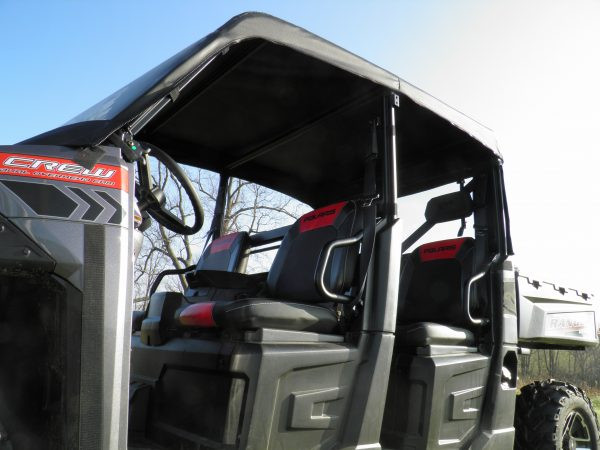 Driver side close-up of the 3 Star soft top above the front seats of a Polaris Ranger 900 Crew