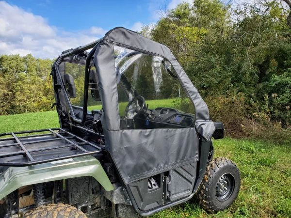 3 Star soft door on a green Honda Pioneer 500, rear three-quarter view showing the door zipped closed