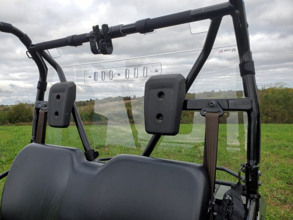 View from inside the cab of the 3 Star Lexan rear window with vent slots behind the Honda Pioneer 500 bench seat