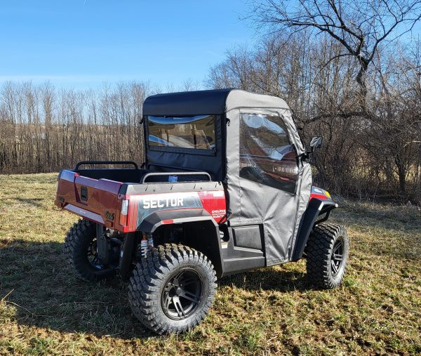Rear three-quarter view of a red Hisun Sector 450 with the 3 Star full cab enclosure, rear window and top installed