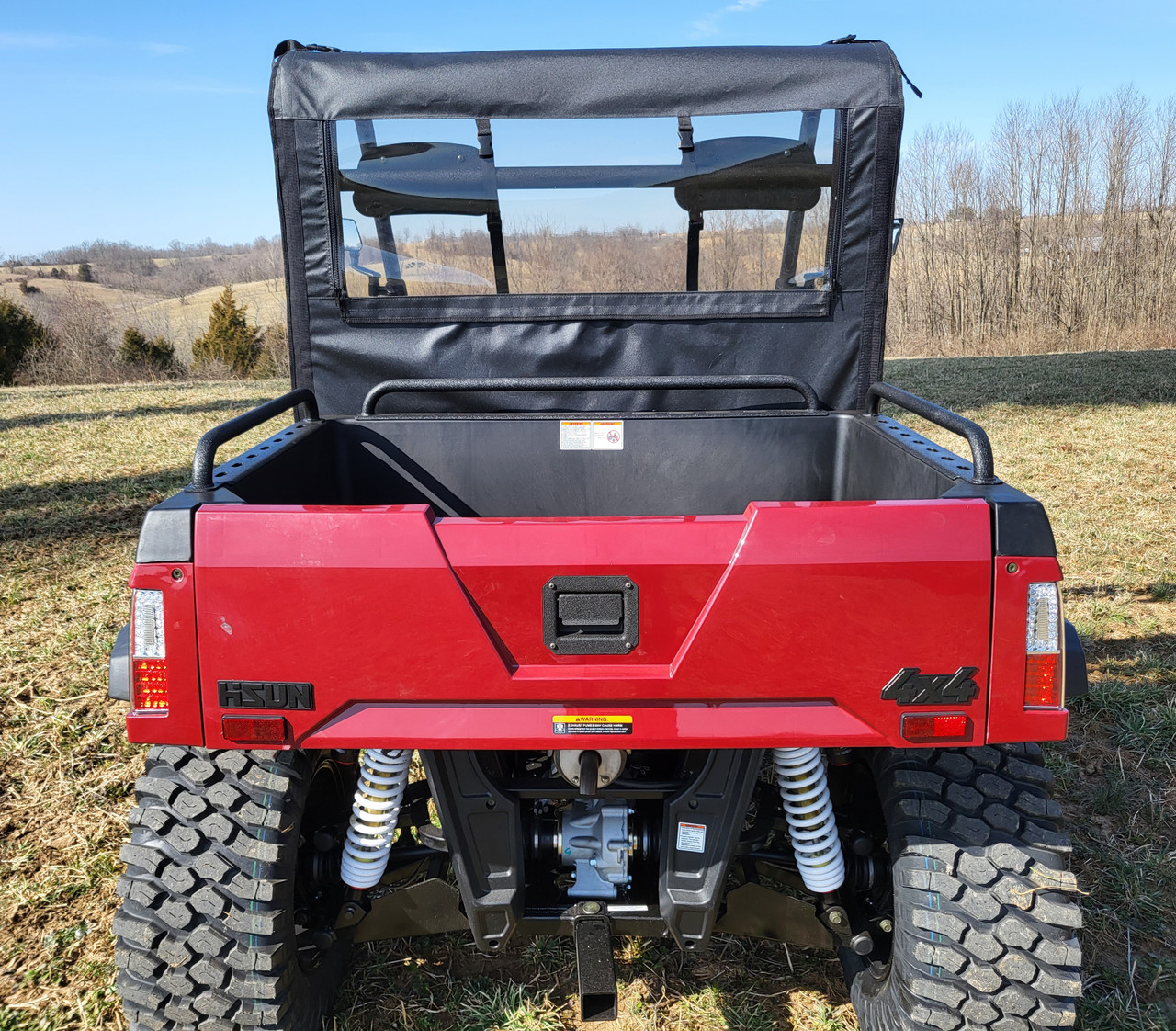 Straight rear view from behind the tailgate of the 3 Star soft back panel and soft top on the Hisun Sector 450
