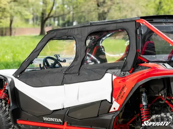 SuperATV soft upper doors on the Honda Talon 1000X-4 with the front window panel opened, steering wheel visible