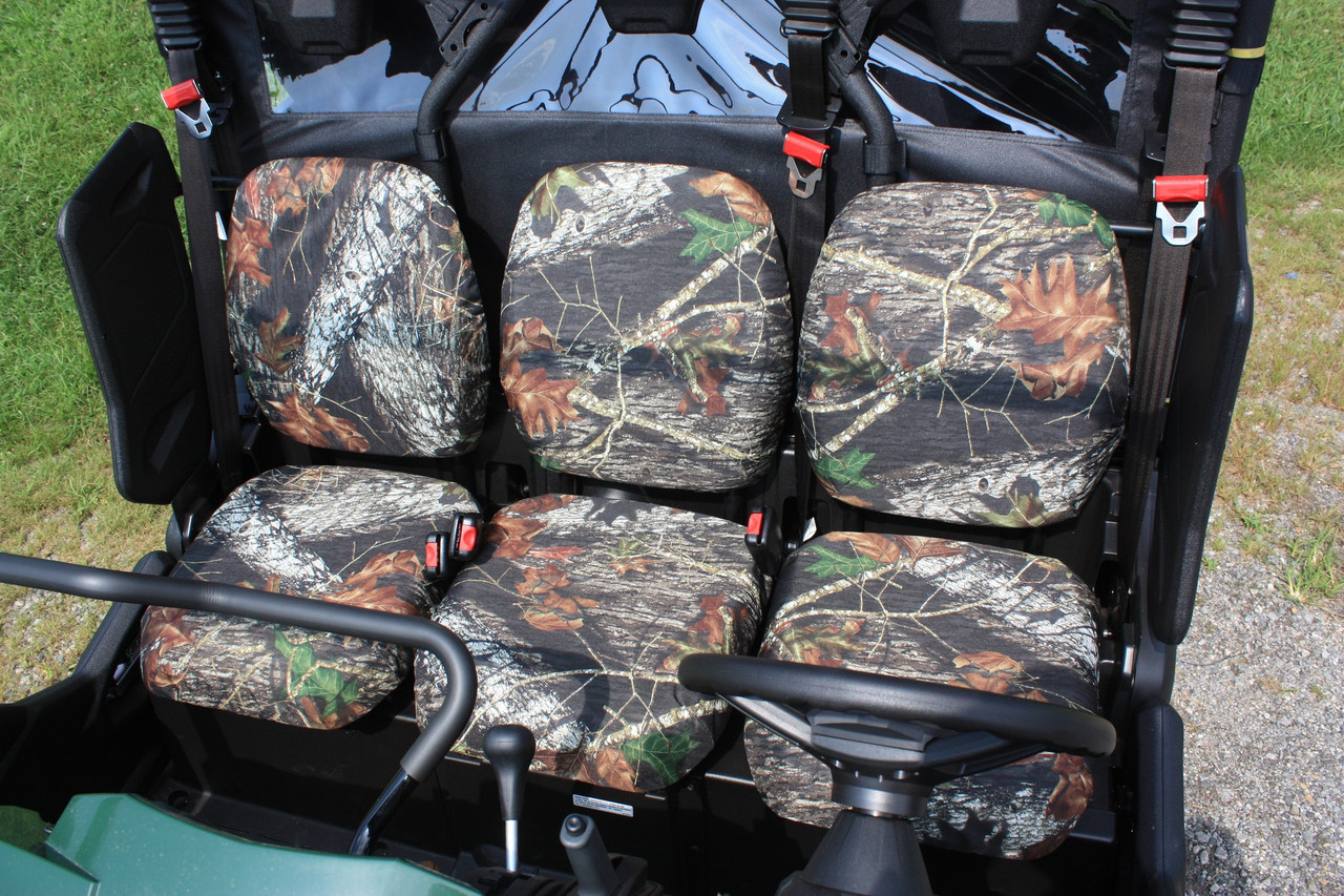 Greene Mountain camo seat covers on the front bench of a Yamaha Viking VI, straight-on view