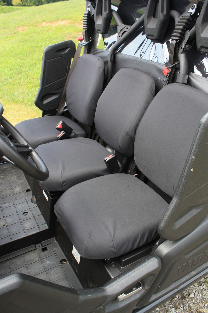 Greene Mountain black seat covers on a Yamaha Viking VI bench, view from the driver side door opening