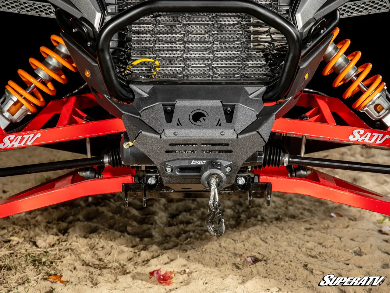 Close-up of the SuperATV winch mounting plate with winch and fairlead on a 2024 Polaris RZR XP 1000 front end