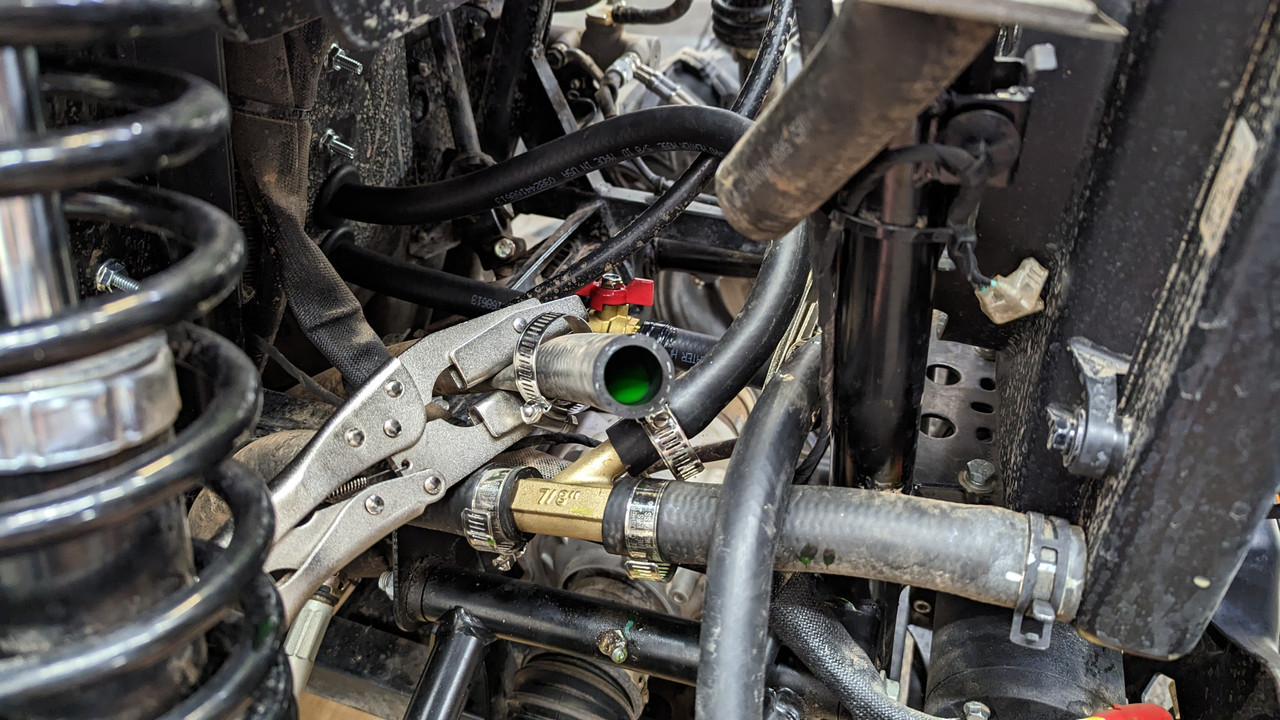 Hose clamp off pliers in action
