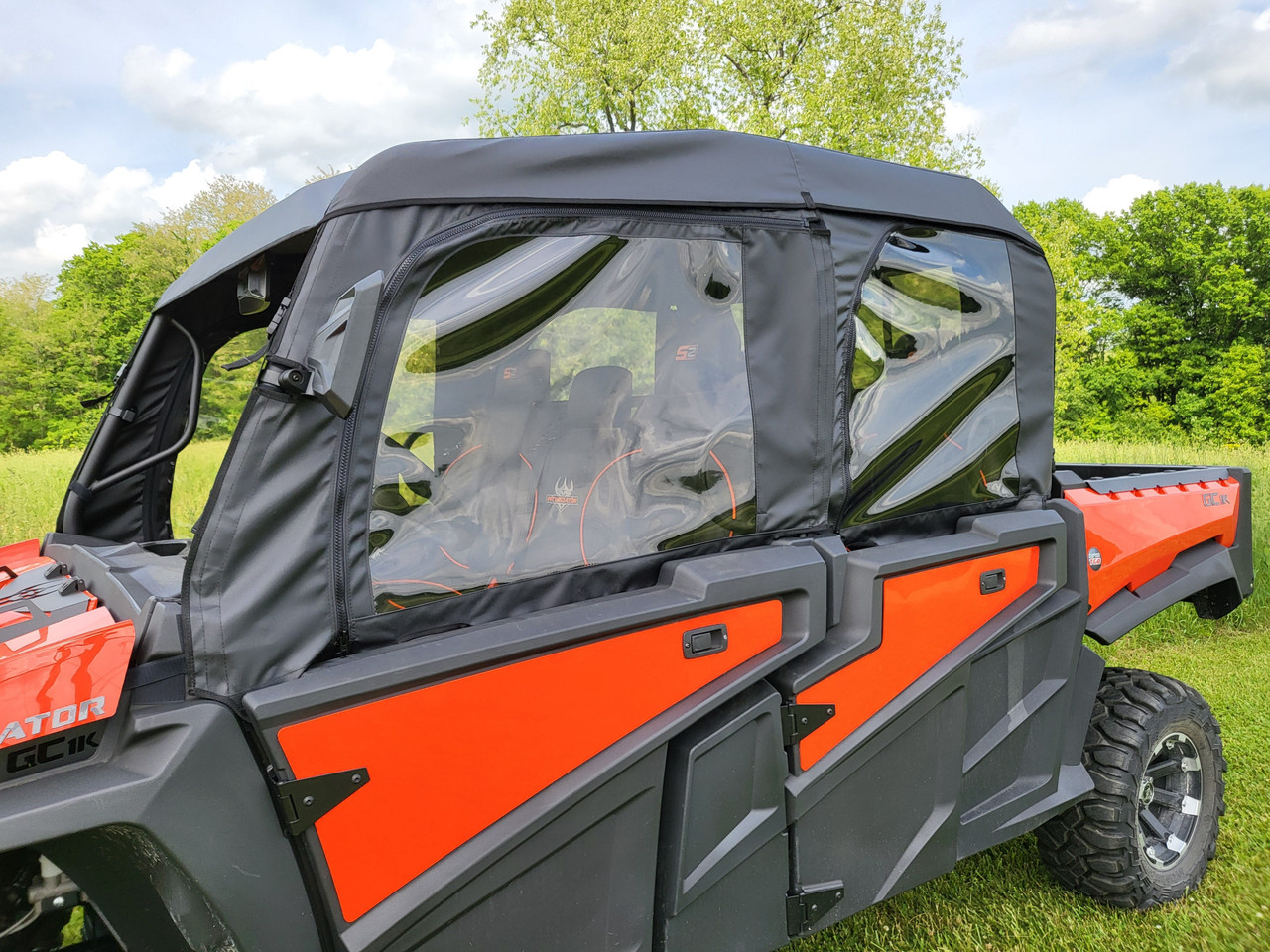Close driver side view of the 3 Star upper doors with clear windows on the Intimidator GC1K 6-seater