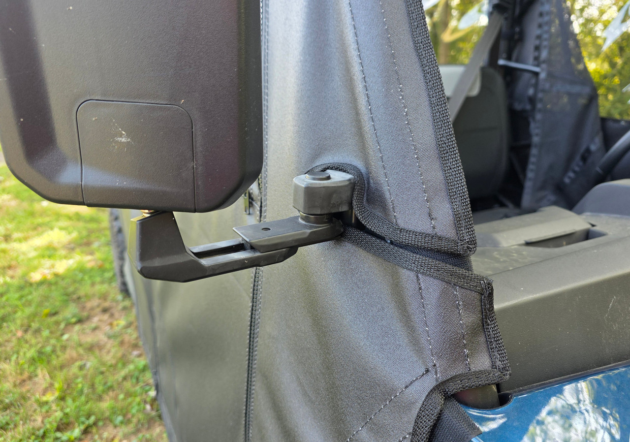Close-up of the 3 Star full door wrapping around the side mirror bracket on a CFMoto UForce 800XL