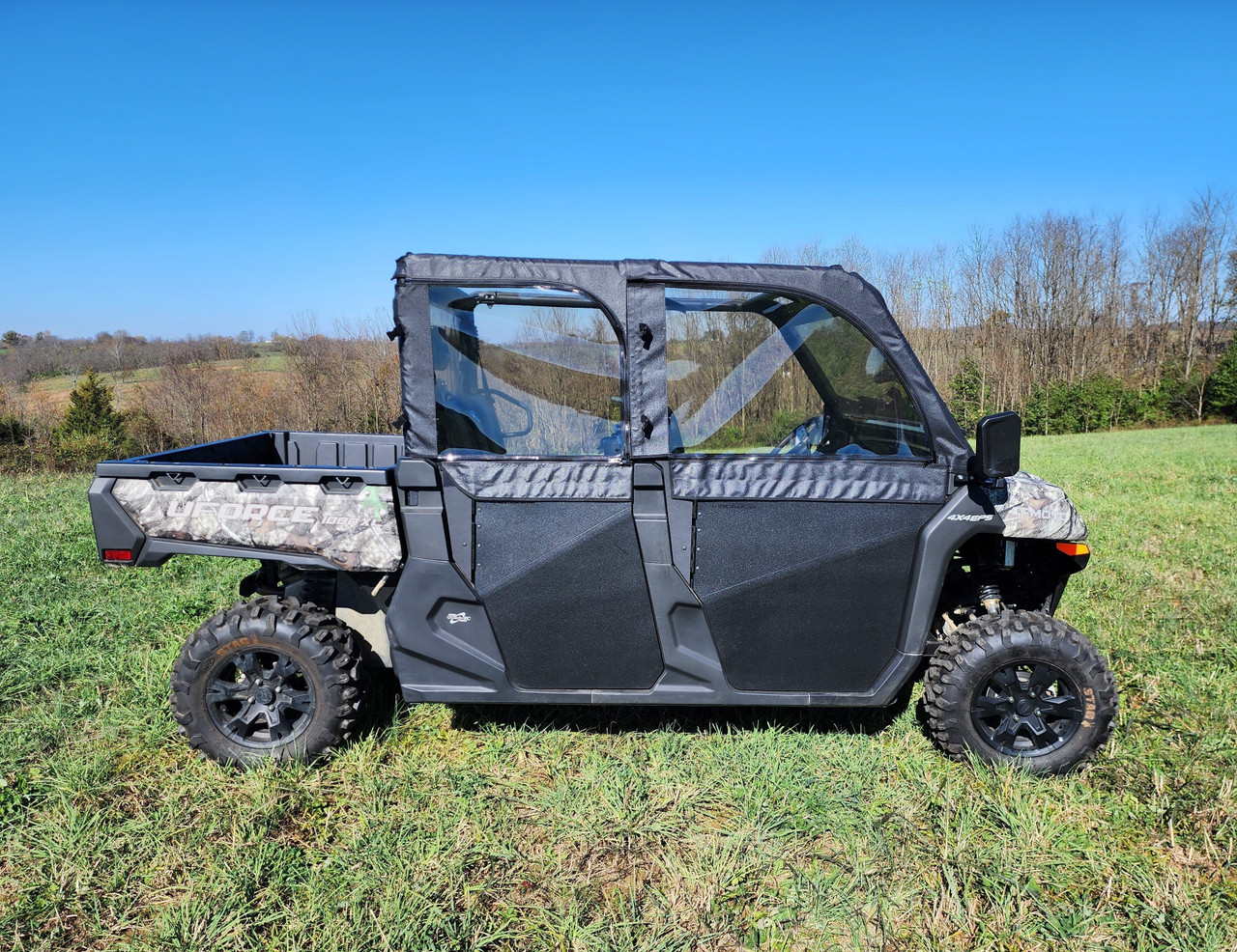 3 Star upper doors and rear window combo on a camo CFMoto UForce 1000XL crew, driver side view in a field