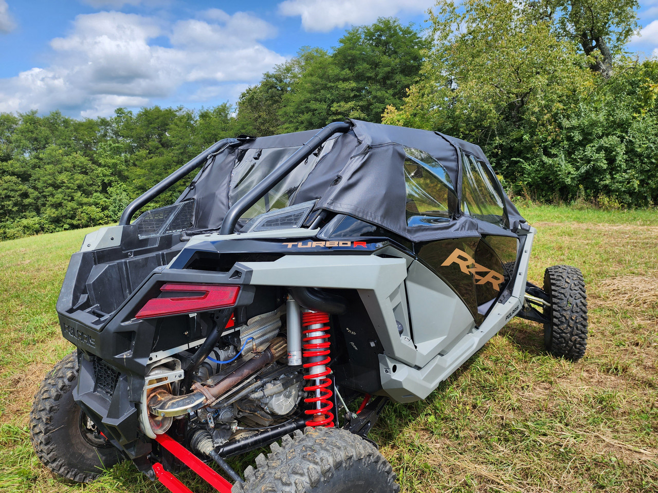 3 Star upper doors and rear window combo on a Polaris RZR Pro XP 4, rear three-quarter view in a field