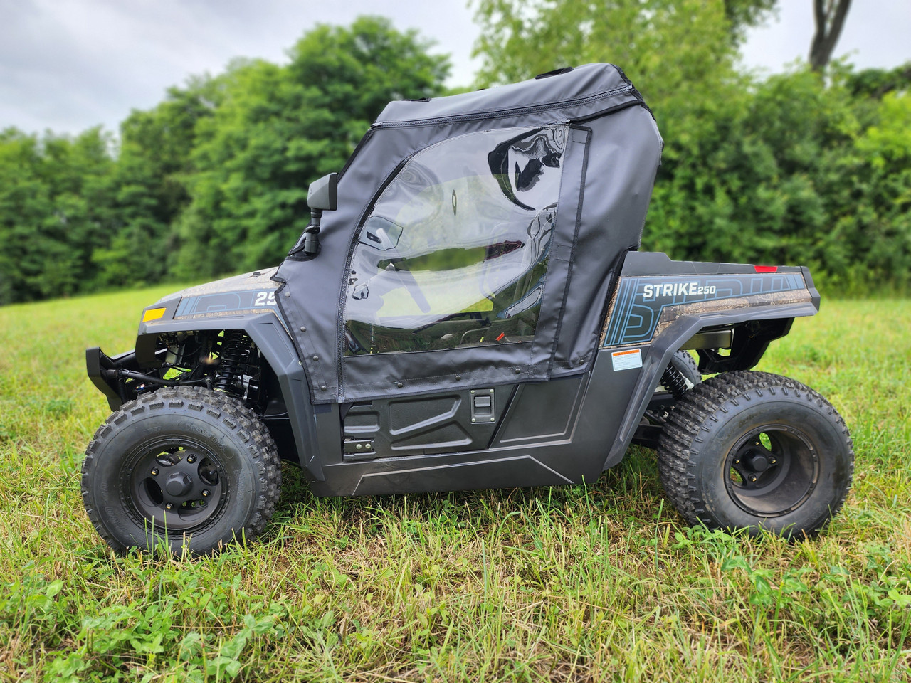 3 Star soft door and rear window combo on a gray HiSun Strike 250, driver side view in a field