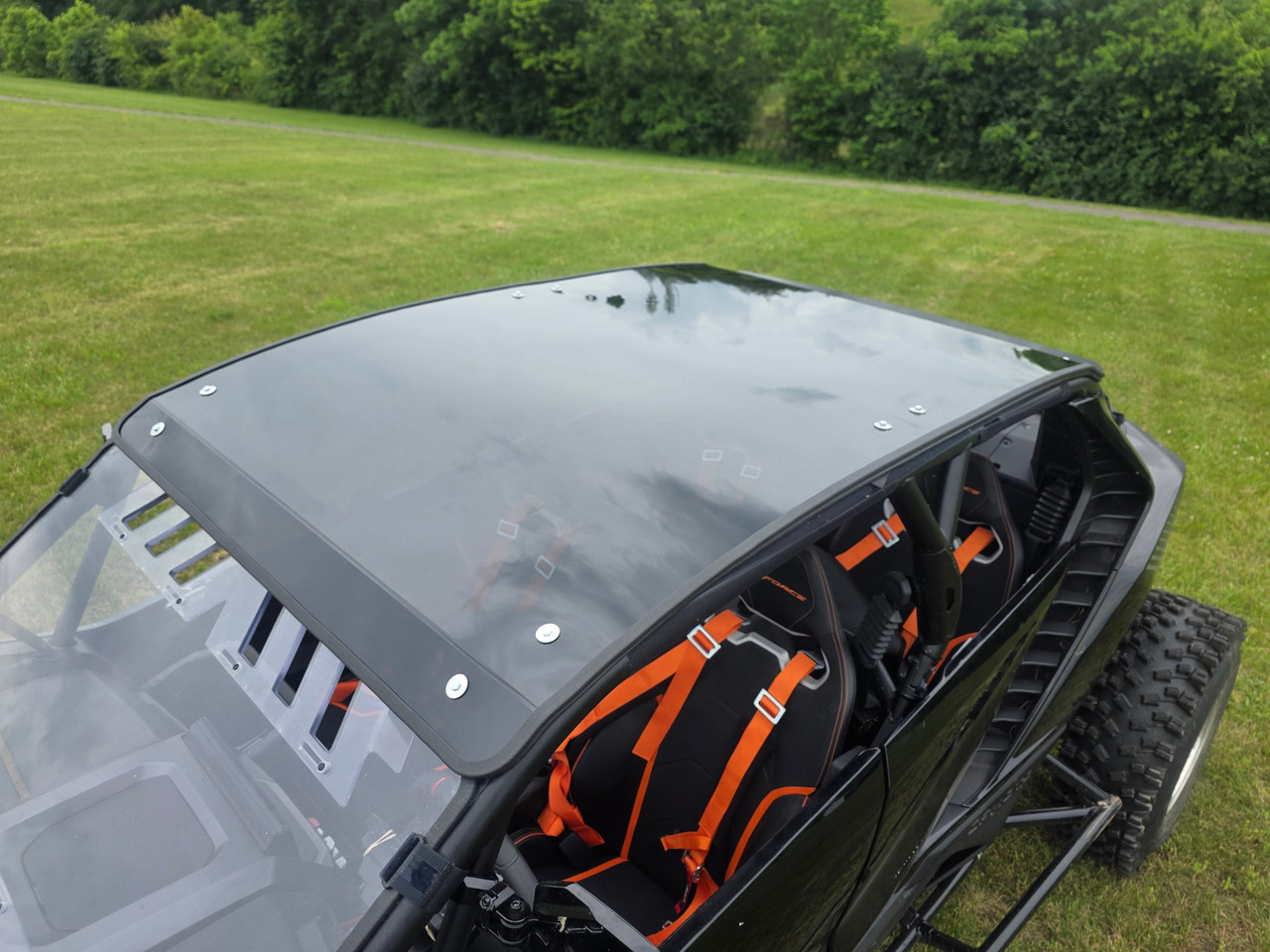 3 Star dark tinted polycarbonate roof on a black CFMoto ZForce Z10-4, high angle view showing the vented front edge