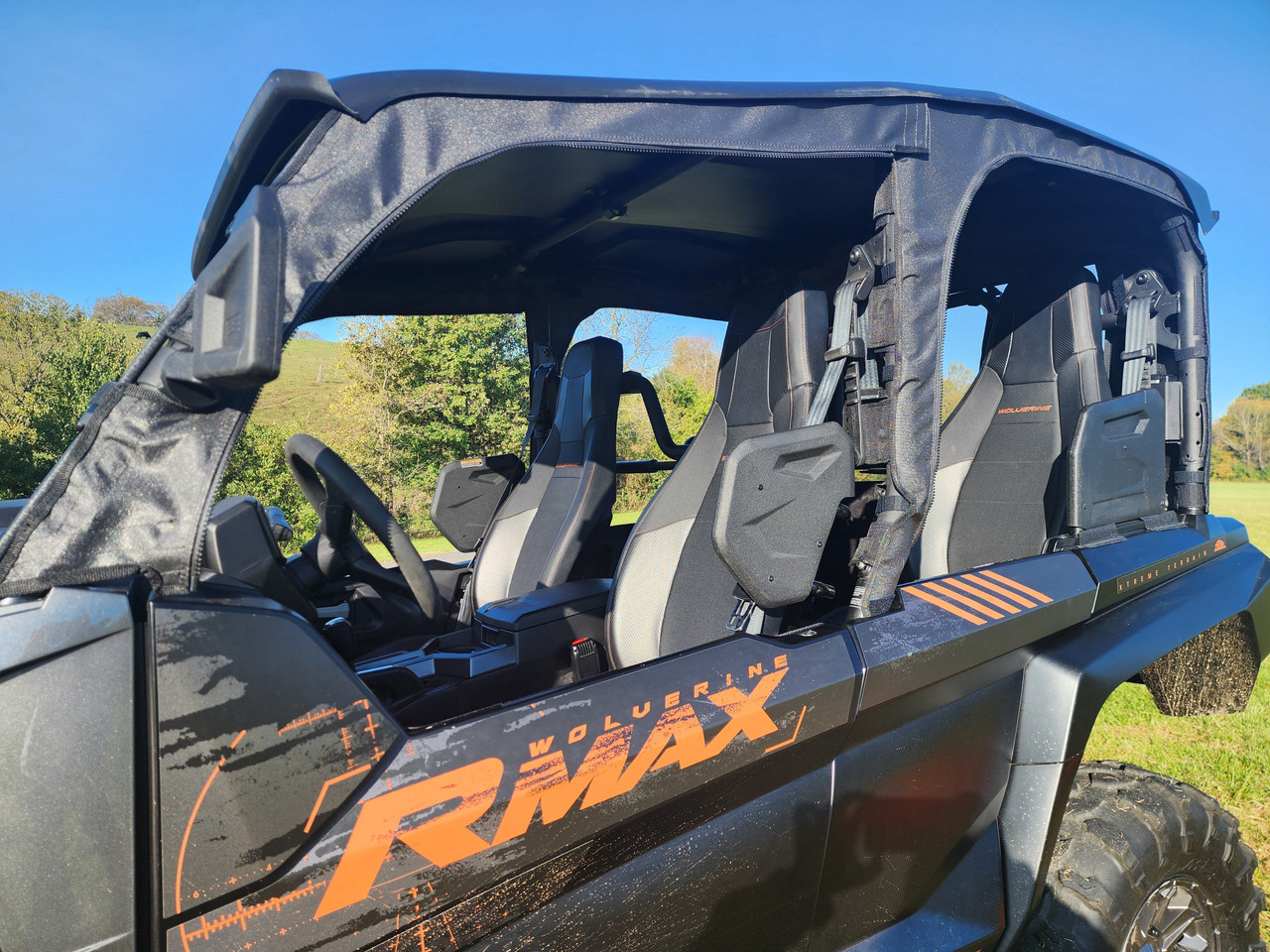 Close-up of the 3 Star upper doors and roof on a Yamaha Wolverine RMAX 4-1000 showing the seats