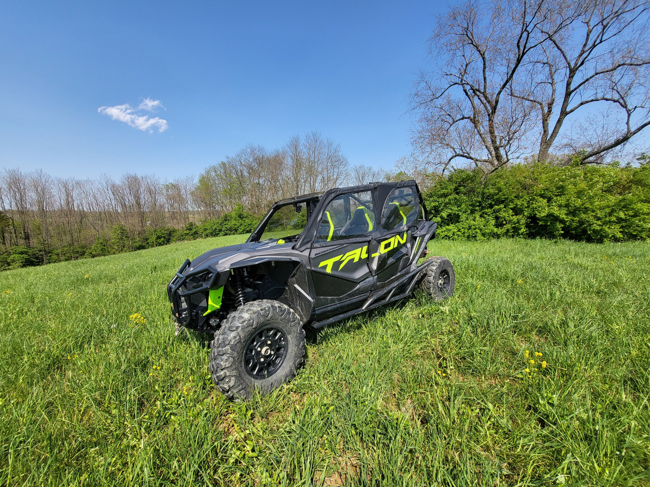 3 Star soft upper doors on a gray and green Honda Talon 4-seater, wide front three-quarter view in a field