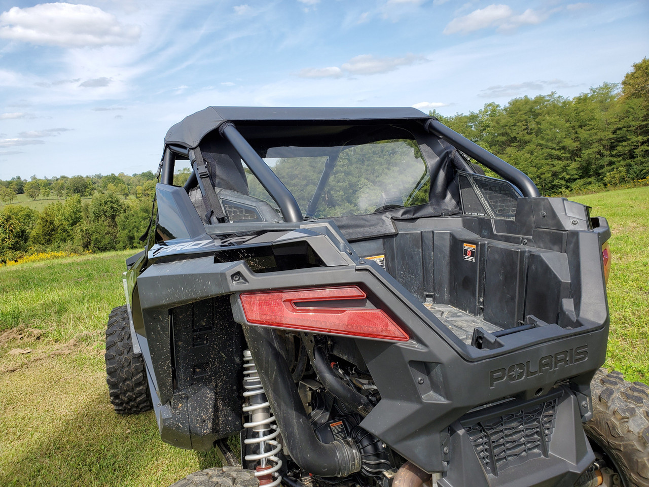 Rear corner view of the 3 Star rear window panel on the Polaris RZR Pro XP above the cargo area