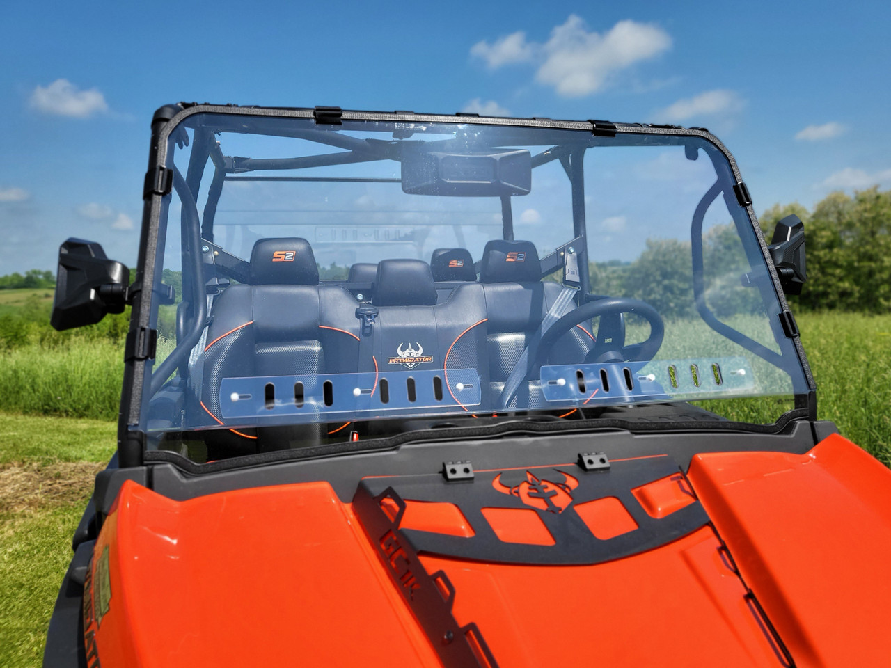 3 Star 1-piece windshield with vents on a red Intimidator GC1K 6-Seater, straight front view over the hood