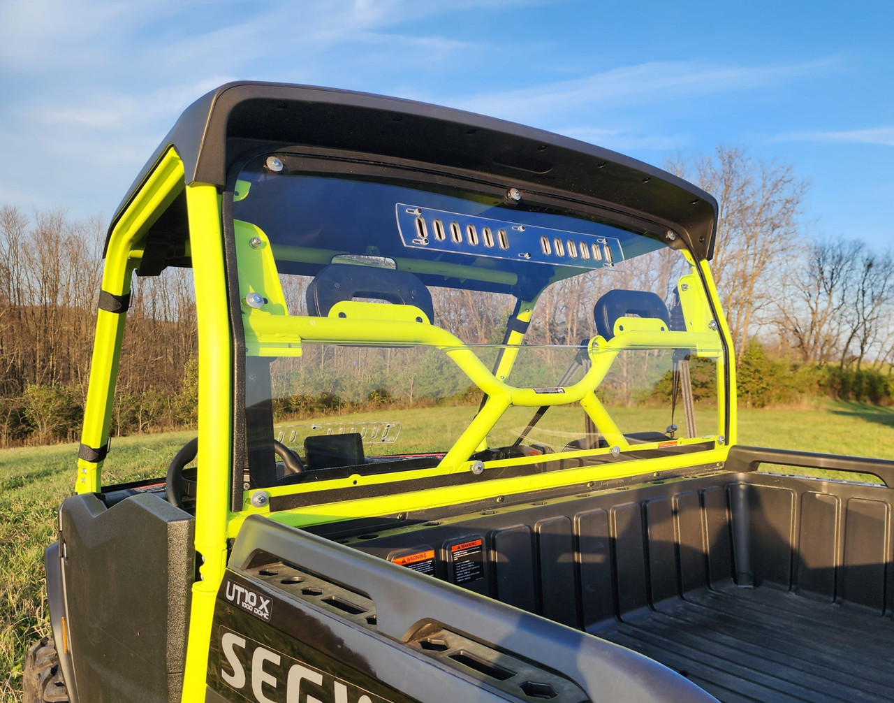 3 Star Lexan back panel seen from the cargo bed of a 2-door Segway UT10 with lime green cage, rear view