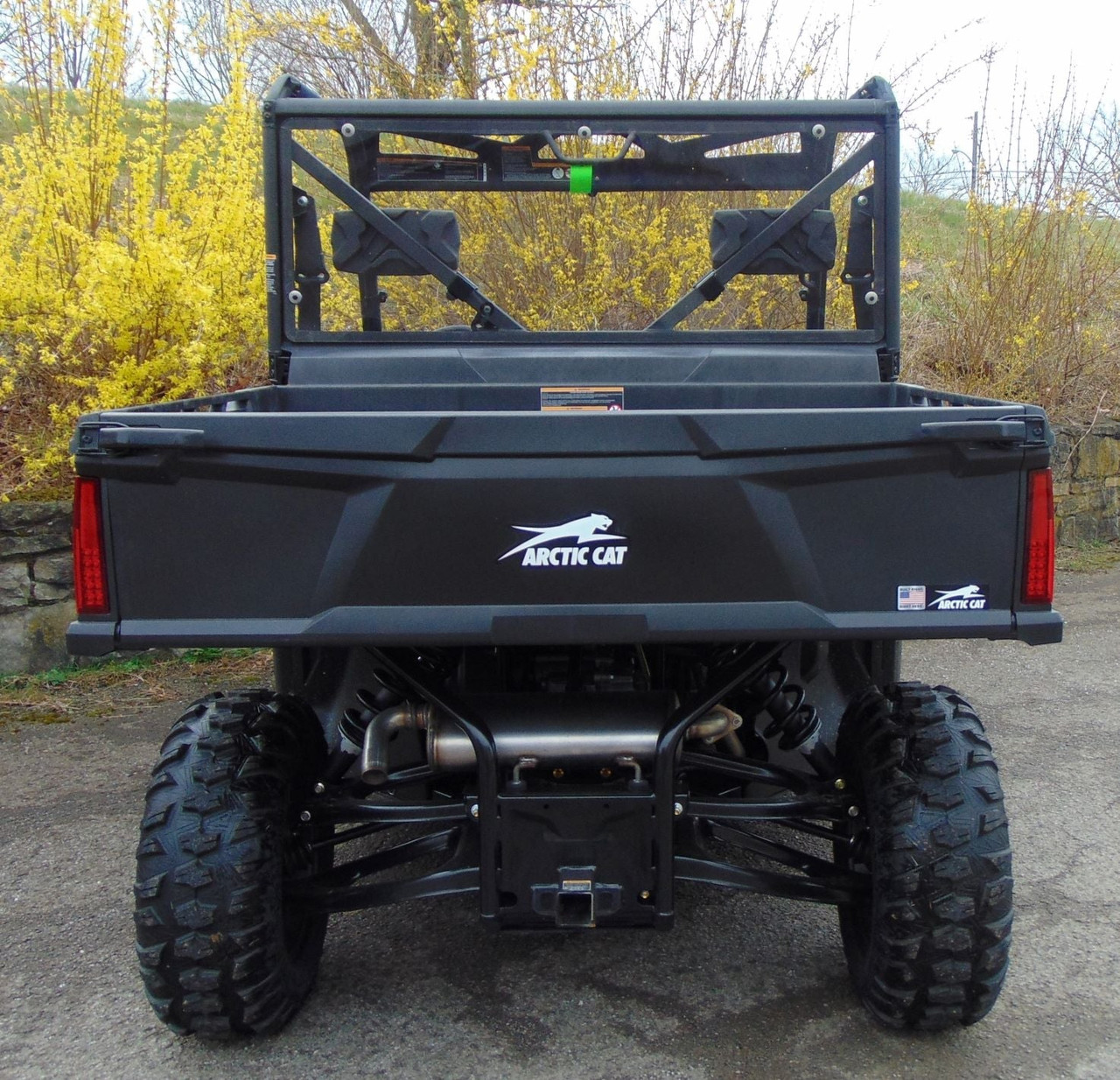 3 Star Lexan back panel behind the cab of a black Arctic Cat Prowler PRO, straight rear view above the tailgate