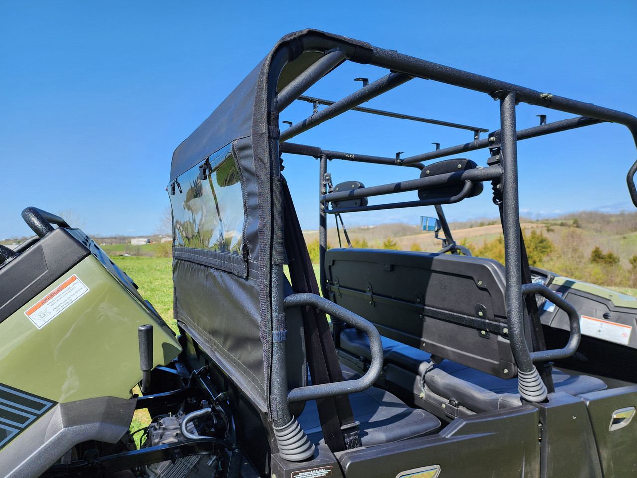 3 Star soft back panel on a HiSun Sector 1000 Crew, rear three-quarter view showing the black panel and clear window