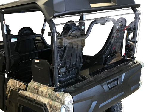 Spike rear windshield for Yamaha Wolverine X-4: clear rear windshield on a camo UTV, rear view