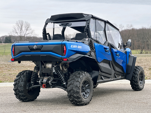 Spike fender flares for Can-Am Commander and Commander MAX: fender flares on a blue Can-Am, rear corner view
