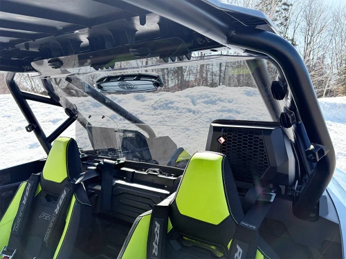 Spike rear windshield for Polaris RZR Pro XP and Pro S 2-seat: rear windshield behind green UTV seats, snowy outdoor setting