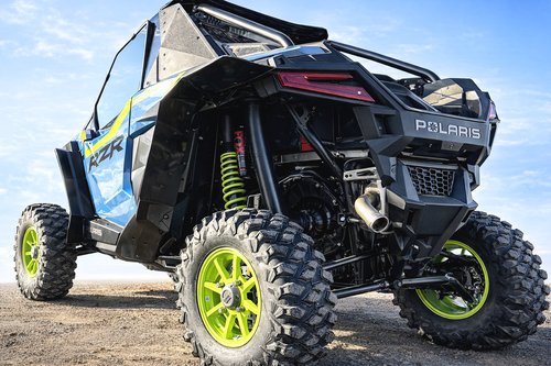 Spike fender flares for Polaris RZR Pro XP: rear fender flares on a blue Polaris RZR Pro, rear corner view
