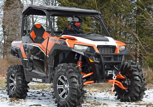 Front three-quarter view of an orange and white Polaris General with SuperATV high clearance front A-arms