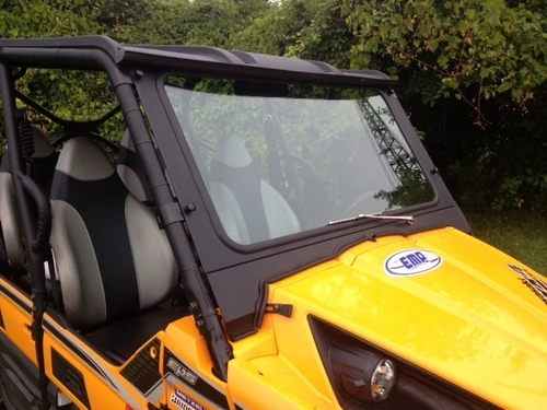 Front three-quarter view of the Extreme Metal Products glass windshield with wiper and roof on the Kawasaki Teryx-4