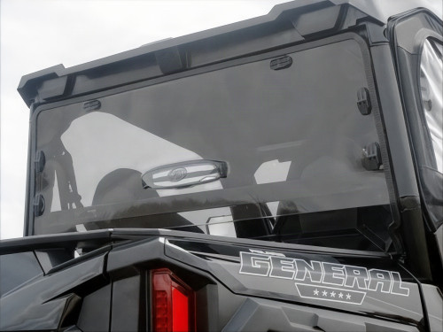 Spike Powersports tinted rear window installed behind the cab of a black Polaris General, rear view with taillight