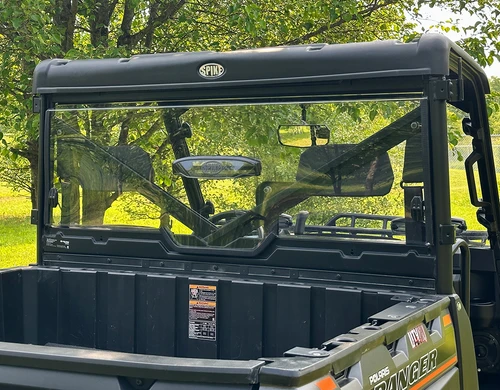Spike rear windshield for Polaris Ranger XP 1000: rear windshield with vent on a green Polaris Ranger, rear view