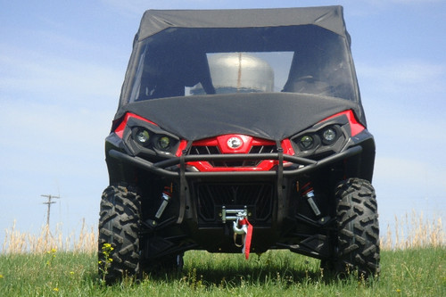 3 Star full cab enclosure with vinyl windshield on a red CanAm Commander, front view with winch bumper