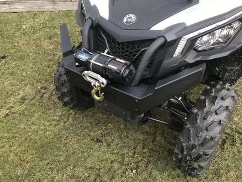 Angled close-up of the Extreme Metal Products brush guard tube and winch on the front of the Can-Am Maverick Trail on grass