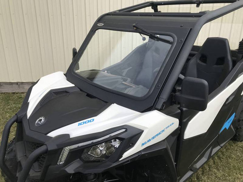 Extreme Metal Products laminated glass windshield with wiper on a white Can-Am Maverick Trail, front three-quarter view