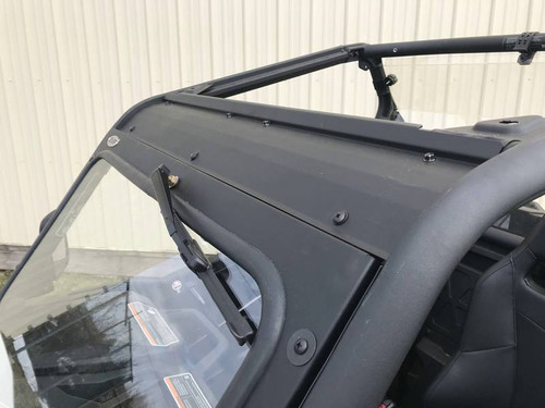 Side close-up of the glass windshield black frame edge and wiper arm on the Can-Am Maverick Trail