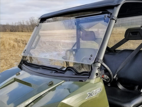 Spike Powersports full size tilting windshield on a green Polaris Ranger XP, front view closed
