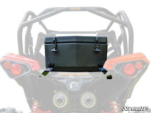 SuperATV rear cargo box mounted above the tail lights of a Can-Am Maverick, rear view with the machine faded out